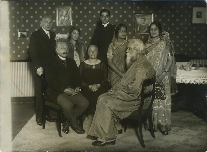 einstein and tagore seated together, mahalanobis standing behind them